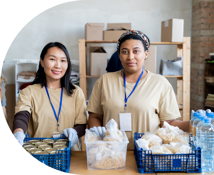 Women volunteering at a community service event. 